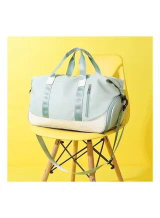 A waterproof sports duffel bag with a modern shoulder design, suitable for the gym, with a place for shoes 