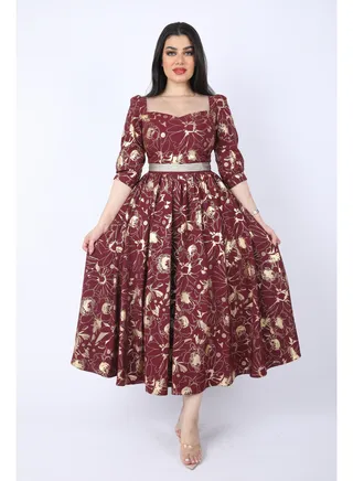 Maxi Dress decorated with a tie on the waist 