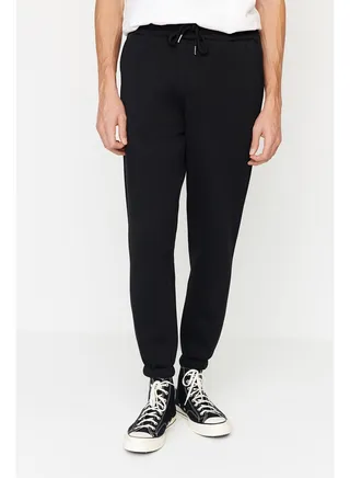 Men's Black, Regular/Regular Cut. Elasticated Elastic Joggers, the inner part is Soft Pile Sweatpants TMNAW22EA0346. 