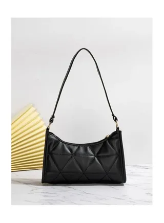Handbag for women decorated with embossed patterns 