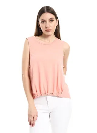 Top with ruffles in the front and open lower back 