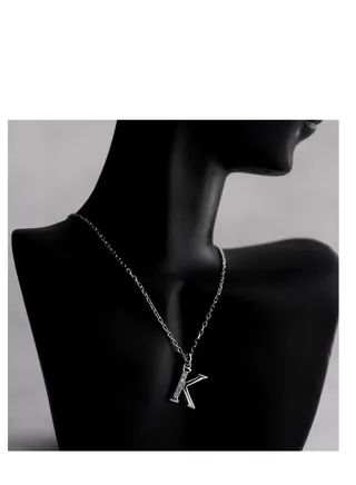 A unique silver women's chain with a letter pendant design K 