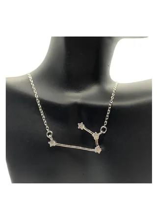 A unique women's silver chain with a pendant design in the shape of space stars 