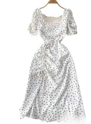 Women's mid-length dress with a slit from the side 