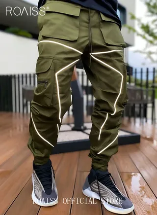 Fashion Print Men Cargo Trousers  Multiple Pocket Design  Sports Trousers Reflective Tape Design  Velcro Feet Breathable Fabric  Solid Color 