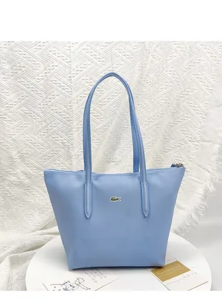 Lacoste medium size handbag light blue 