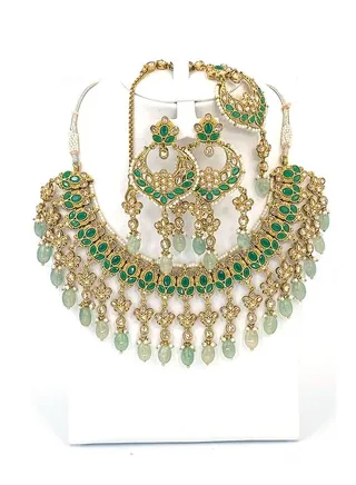GOHONA Royal Bling Bollywood Traditional Indian Handmade Brass Metal Jewellery Necklace With Earrings Set and 1 Tikka in Green colour 