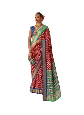 Traditional Silk Red Saree With Green Border And Pallu Having Patola Design Plus Unstitched Blue Blouse 