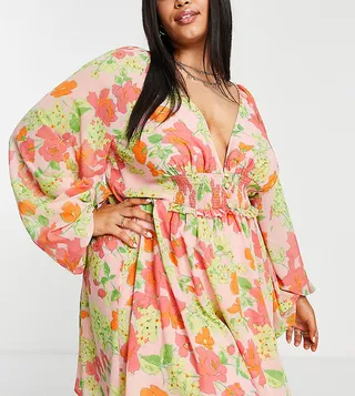ASOS DESIGN Curve soft shirred waist mini dress in peach floral