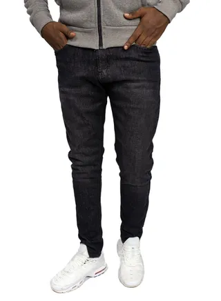 CARROT FIT JEANS TROUSERS 