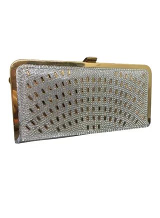 A luxurious women's bracelet bag, gold and silver, decorated with a golden metal arm 