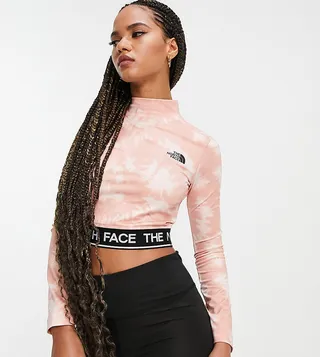 The North Face Perf cropped long sleeve t-shirt in pink Exclusive at ASOS