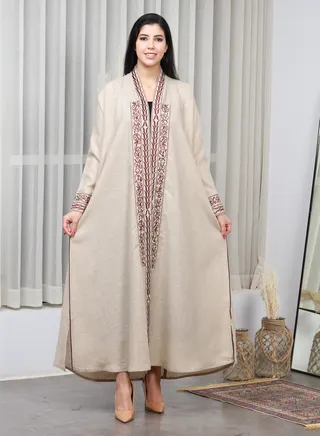 Beige abaya distinguished by brown thread embroidery on the sleeves, collar and cuffs 