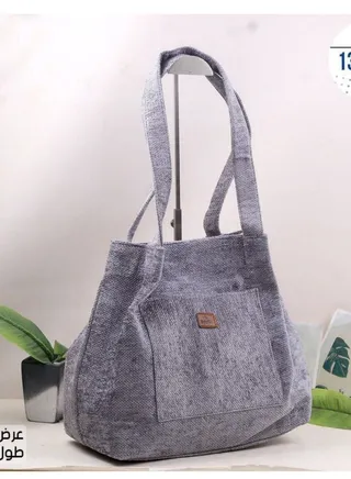 A chic women's bag with an attractive and elegant shape, gray in colour 