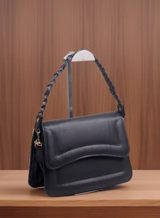 A chic and practical women's bag made of leather, black 