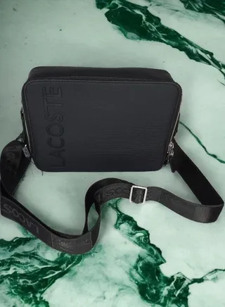 Elevate Your Style with the Lacoste Clutch Bag - Your Perfect Fashion Accessory 