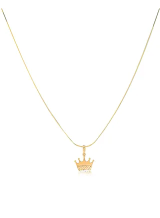 An 18-karat gold crown-shaped pendant, a majestic symbol of royalty and elegance 