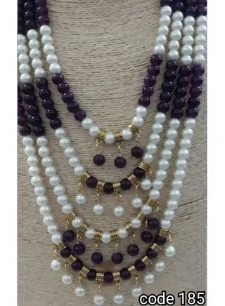 Multi-layered women's necklace made of white and black Mallorcan wali 