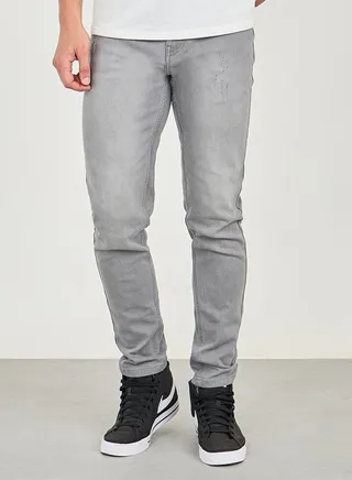Mid Rise Light Wash Ripped Skinny Jeans