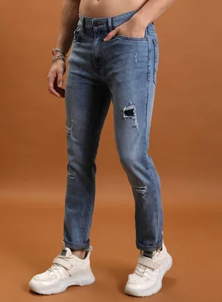 Light Distress Mid Rise Jeans
