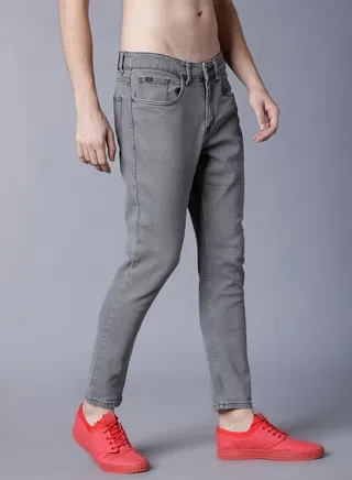 Mid Rise Light Wash Tapered Jeans 