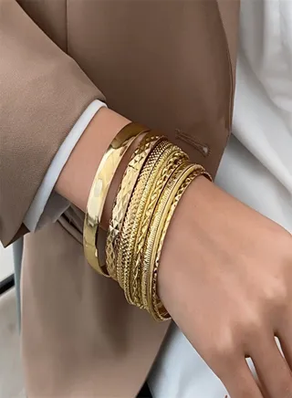 Gold and silver two sets of ten bracelets with different textures can be worn in combination or alone for parties and wedding gifts for everyday use with fashion accessories 