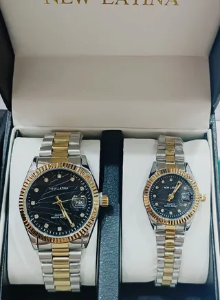 Two Rolex-style watches with stainless steel hands and bracelet 