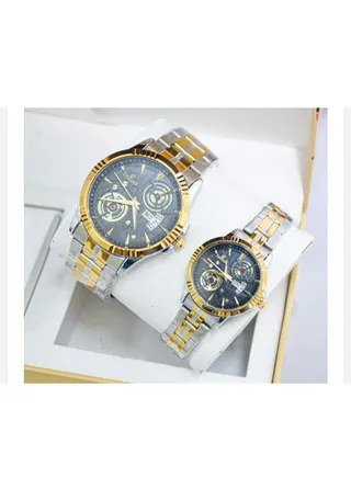 A unisex watch set made of stainless steel, water resistant, scratch resistant and shock absorbent. 