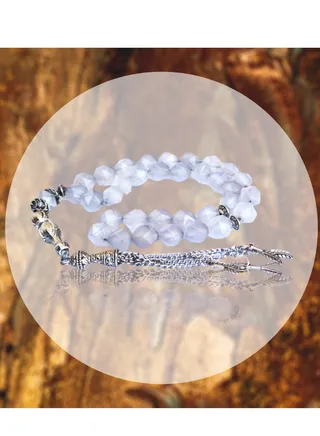 A luxurious rosary made of onyx stone, with a unique design in a snowy colour, a rosary made of precious stones 