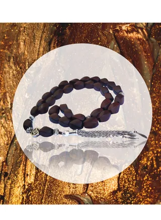 Black oval onyx rosary is an elegant piece that combines the beauty of natural stones with its unique design 