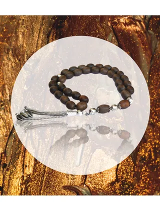Rosary of supplication and remembrance is characterized by warm shades of color, with distinctive natural details that reflect the beauty of the craftsmanship, rounded beads 