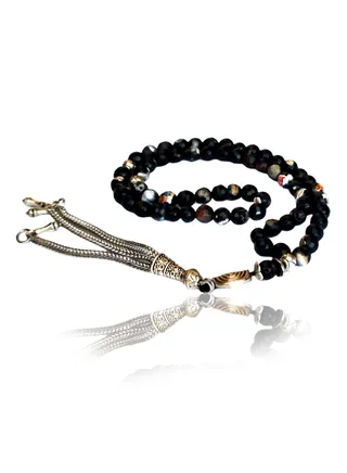 Brazilian agate rosary features small, wavy black agate beads that combine the beauty of agate with a unique design. 
