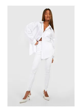 Distressed Asymmetric Hem Skinny Jeans 