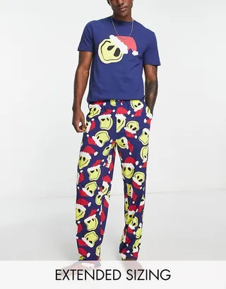 ASOS DESIGN Christmas pajama set with t-shirt and lounge bottom in blue with santa smile print