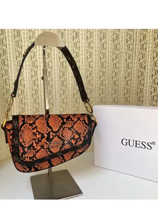 GUESS Small shoulder bag with 4G monogram print 