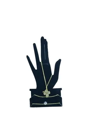 Women's Finger Bracelet In Gold Color With A Metal Ring Decorated With Multiple Stones 