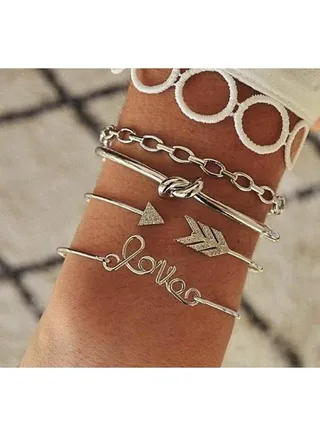 Set of 4 silver color bracelets - women 