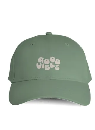 Green daily cap with a print of "GOOD VIBES" 