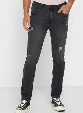 Rip And Repair Tapered Fit Jeans 