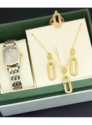 A set of an analog watch and a set consisting of a necklace, earring and a ring for women 