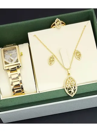 A set of an analog watch and a set consisting of a necklace, earring and a ring for women 