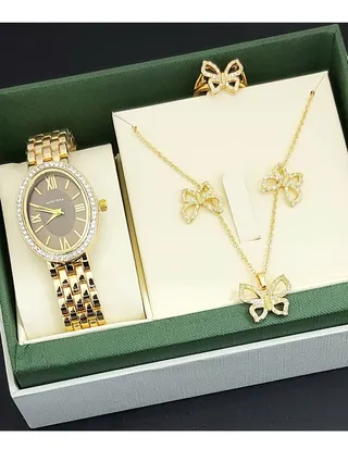 A set of an analog watch and a set consisting of a necklace, earring and a ring for women 