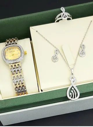 A set of an analog watch and a set consisting of a necklace, earring and a ring for women 