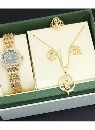 A set of an analog watch and a set consisting of a necklace, earring and a ring for women 