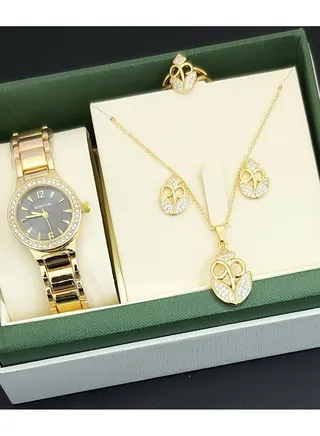 A set of an analog watch and a set consisting of a necklace, earring and a ring for women 