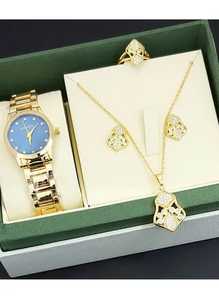 A set of an analog watch and a set consisting of a necklace, earring and a ring for women 