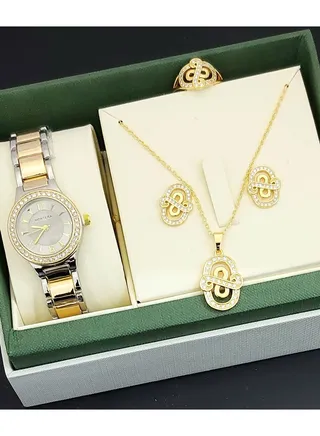 A set of an analog watch and a set consisting of a necklace, earring and a ring for women 