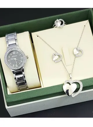 A set of an analog watch and a set consisting of a necklace, earring and a ring for women 