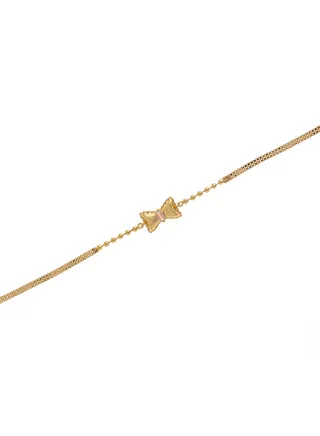 A soft bracelet with a bow charm and circles on both sides 