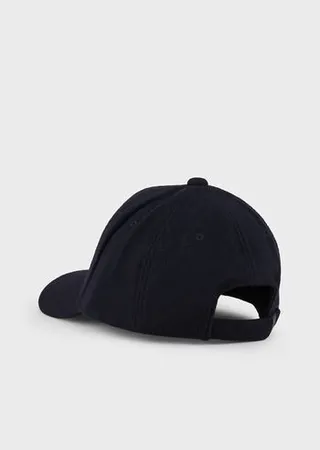 Baseball cap with embossed embroidered lettering